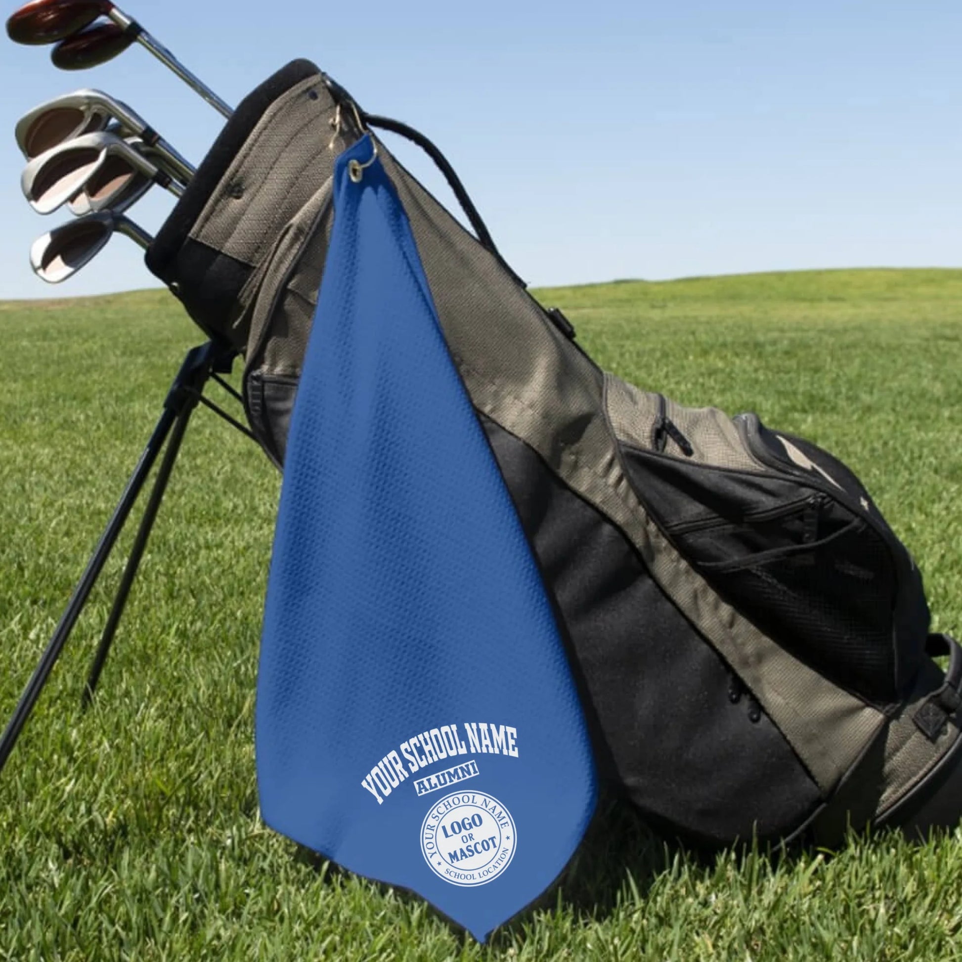A classic black custom alumni golf towel, a perfect and practical gift for class reunions or alumni golf tournaments.