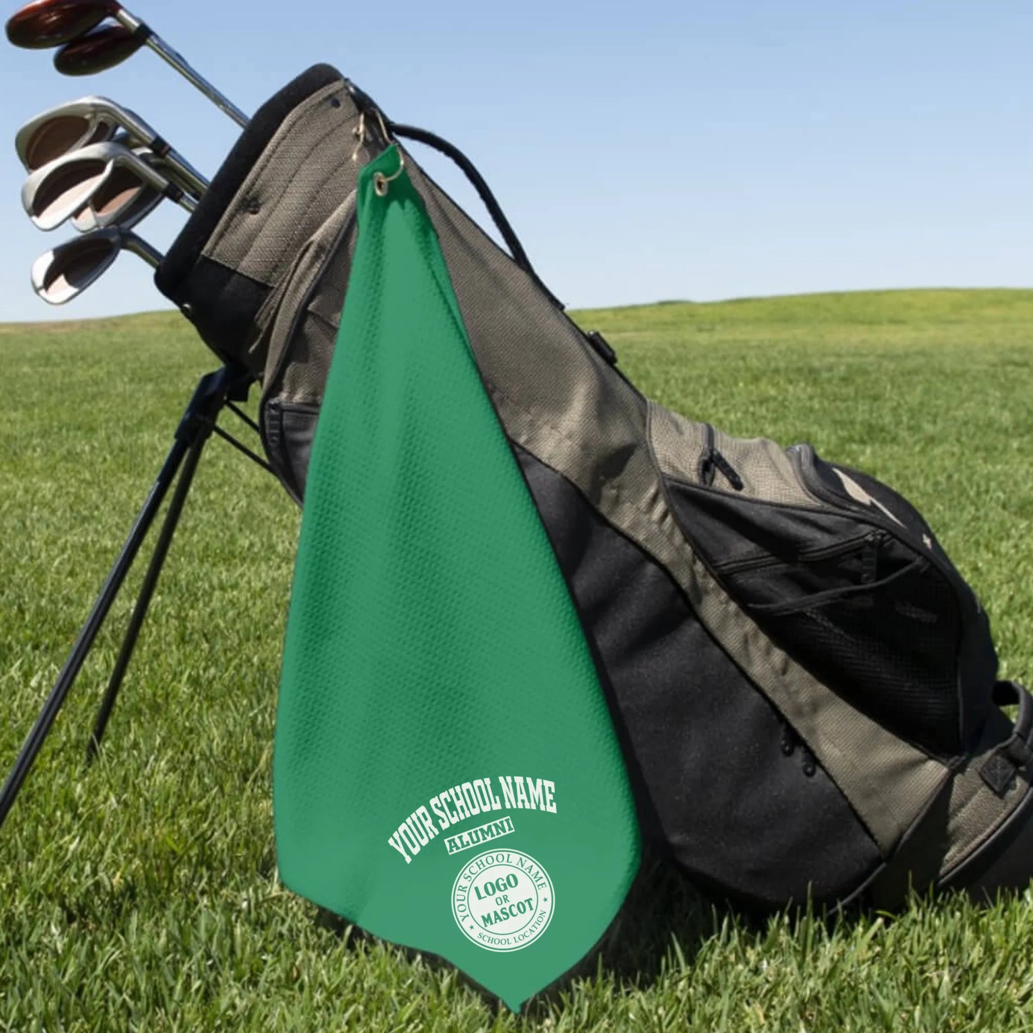 A classic black custom alumni golf towel, a perfect and practical gift for class reunions or alumni golf tournaments.