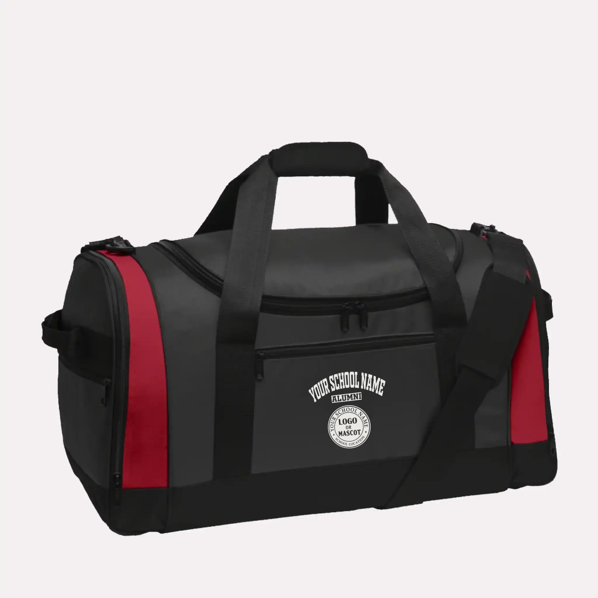 A vibrant red personalized graduation gift: the Voyager alumni duffel bag with a custom school emblem.