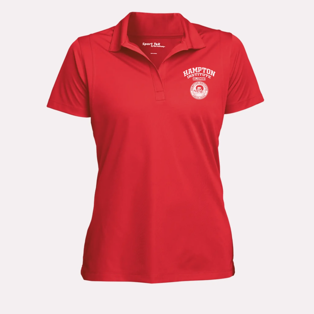 A royal blue women's performance polo, a great university alumni gift for her with a modern, tailored silhouette.